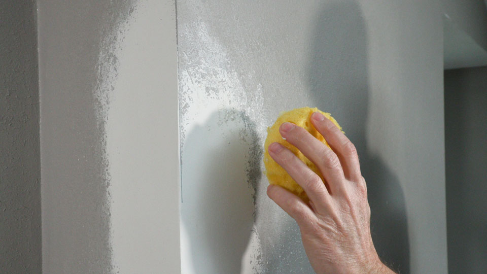 using a texture sponge to create the textured wall